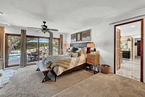 Carpeted bedroom featuring ceiling fan, ornamental molding, access to exterior, and a textured ceiling