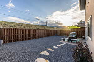 View of yard featuring a patio.*Fence to be painted by HOA in 2025