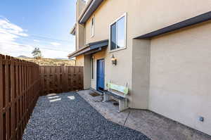 Exterior space with a patio.*Fence to be painted by HOA in 2025