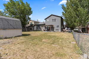 View of yard featuring a storage shed