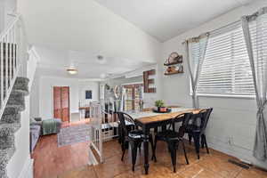 Dining area with tile patterned floors