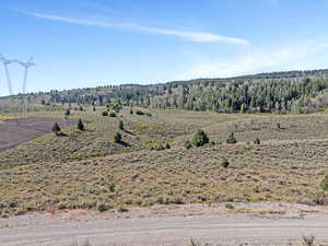 Property view of mountains with a rural view