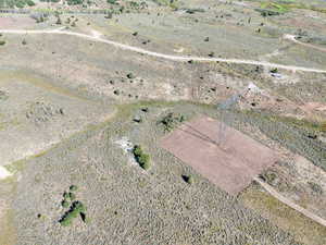 Birds eye view of property with a rural view