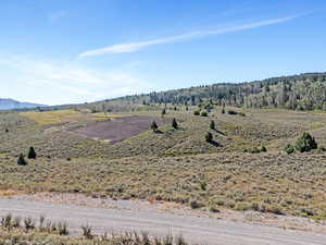 View of mountain feature with a rural view