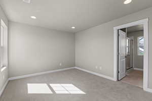 View of carpeted spare room
