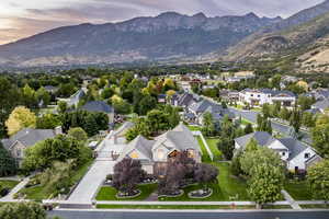 Aerial view at dusk featuring a mountain view