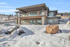 View of snow covered property