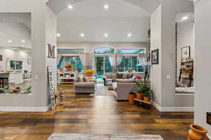 Living room featuring dark hardwood / wood-style flooring