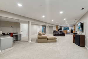 Living room featuring light colored carpet