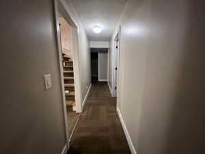 Hallway to three bedrooms