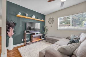 Living room  2 featuring ceiling fan and hardwood / wood-style flooring