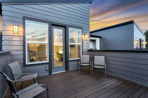 View of deck at dusk