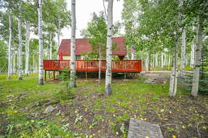 View of yard featuring a deck