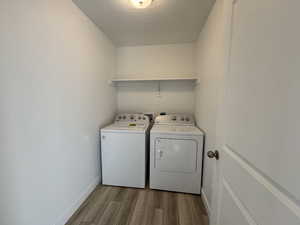 Laundry Room featuring included washer and dryer