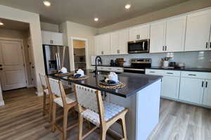 *Photo of model home, upgrades & finishes will vary*