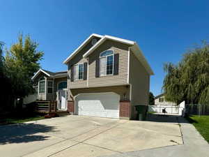 View of front of home with a garage