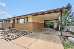 Single story home with a carport