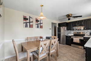 Dining room featuring ceiling fan