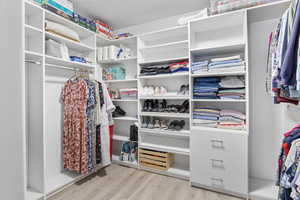 Custom designed master closet.