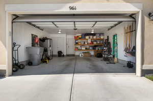 Garage stores utilities, built in storage shelves and central vacuum.