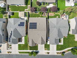 Areal view of house, featuring solar panels