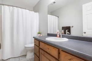 Bathroom accessible to both basement bedrooms and family room.