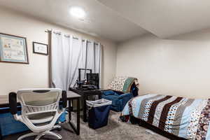 Bedroom featuring carpet flooring