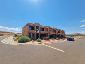 View of building exterior featuring a mountain view