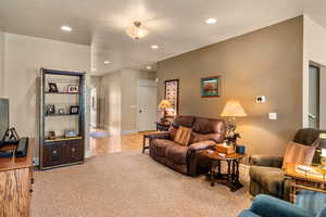 Living room with light wood-type flooring