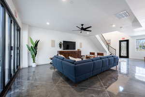 Living room featuring ceiling fan