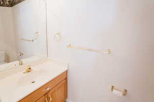 Bathroom featuring toilet and vanity