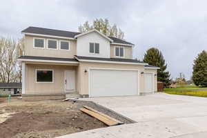 View of front of home with a garage