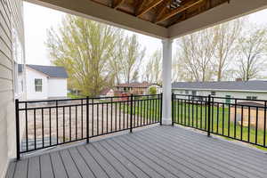 Deck featuring a lawn