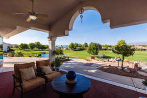 View of patio featuring ceiling fan