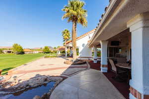 View of patio / terrace featuring ceiling fan