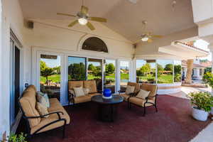 View of patio featuring ceiling fan