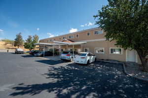 View of front of property with a carport