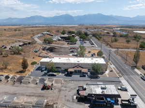 Birds eye view of property featuring a mountain view