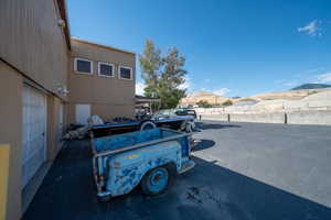 View of car parking with a garage