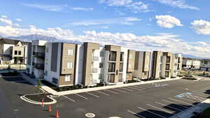 View of building exterior featuring a mountain view