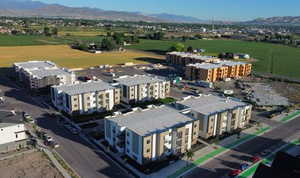 Birds eye view of property with a mountain view