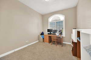 Bedroom with light carpet