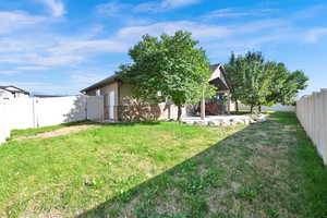 View of yard with a patio area