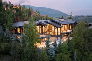 Back house at dusk with a mountain view