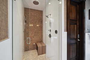 Bathroom with a shower with door