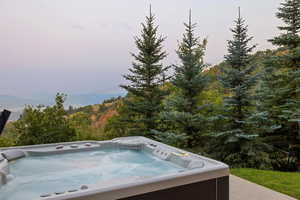 Exterior space featuring a hot tub