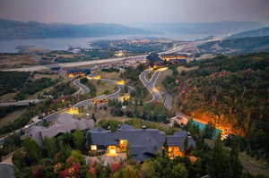 Aerial view at dusk featuring a mountain view