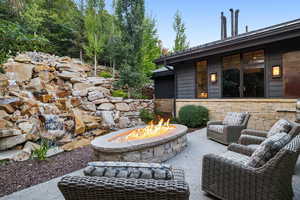 View of patio featuring a fire pit