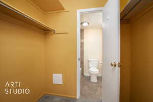 Spacious closet featuring tile patterned flooring