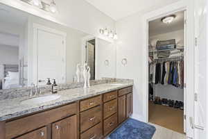 Bathroom featuring vanity and tile patterned floors